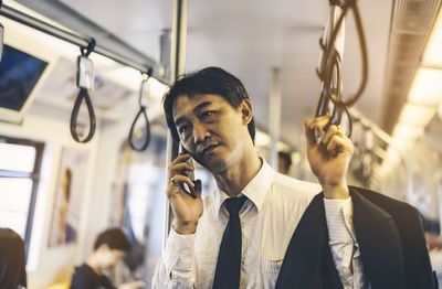 Young man using mobile phone