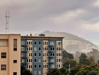 Low angle view of residential building against sky