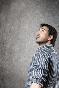 Portrait of a young man looking away