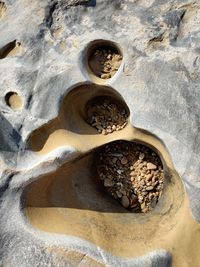 High angle view of pastries on rock