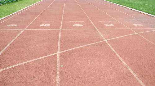 High angle view of numbers on running track