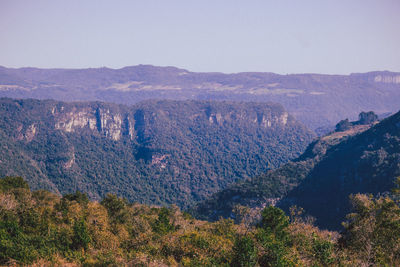 High angle view of trees and mountains against sky