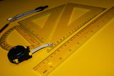 High angle view of arrow symbol on table