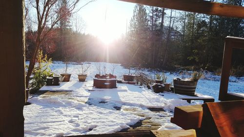 Snow on table against sky during winter