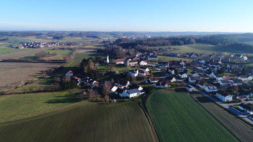 High angle view of agricultural field against clear sky