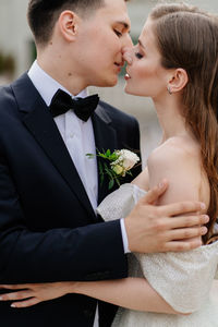 Happy couple kissing in park