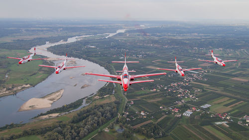 Aerial view of airplane flying over landscape