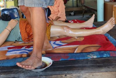 Low section of woman preparing food