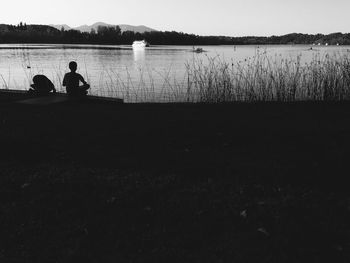 People sitting in lake