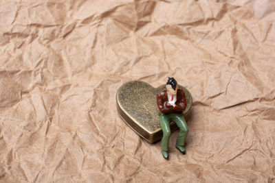 High angle view of seashell on sand
