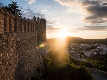 Castle against sky during sunset