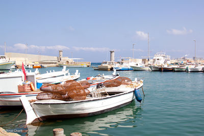 Boats moored in harbor