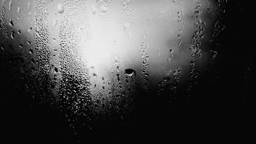 Close-up of raindrops on window