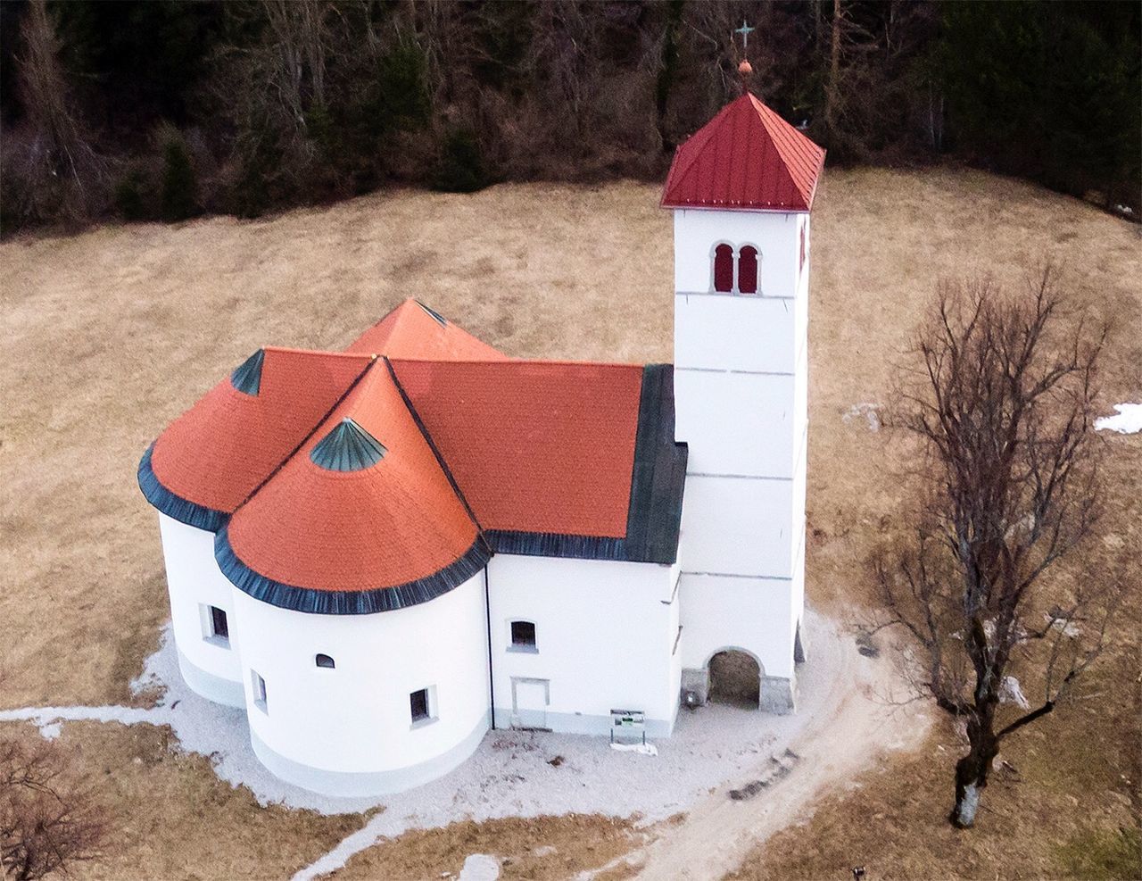 built structure, architecture, building exterior, building, tree, winter, no people, nature, snow, cold temperature, land, day, red, outdoors, plant, landscape, place of worship, environment, field