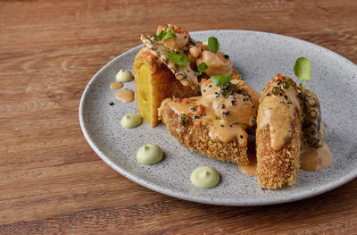 Close-up of food in plate on table