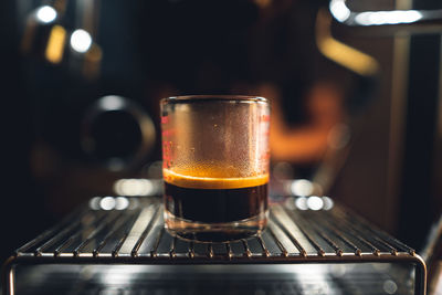 Close-up of beer glass on table