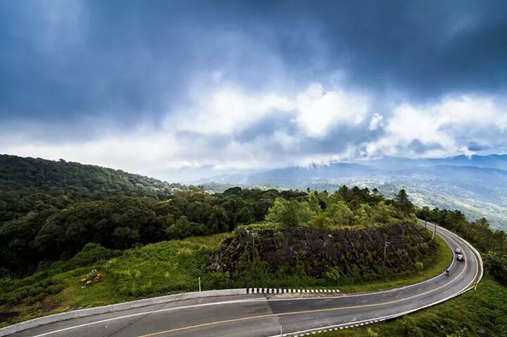 transportation, road, sky, mountain, road marking, cloud - sky, car, landscape, scenics, beauty in nature, tranquil scene, the way forward, nature, cloud, tranquility, tree, country road, mode of transport, land vehicle, cloudy