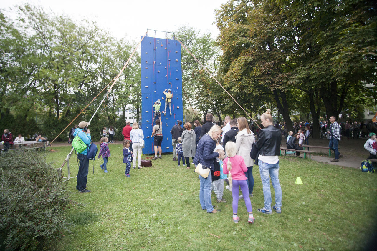 PEOPLE PLAYING IN PARK