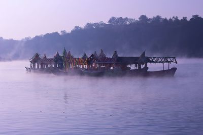 Boats in foggy winter