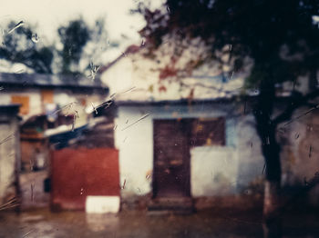 Close-up of wet wall against sky