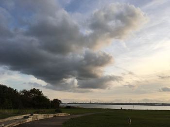 Scenic view of dramatic sky over landscape