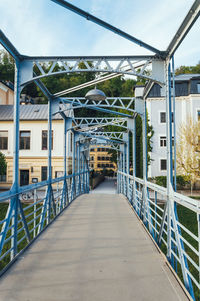 View of footbridge leading to residential structure
