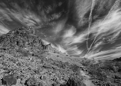 Low angle view of rocks against sky