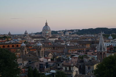 High angle view of buildings in city against sky