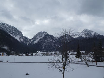 Scenic view of snowcapped mountains against sky
