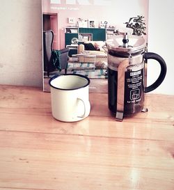 Close-up of tea cup on table at home