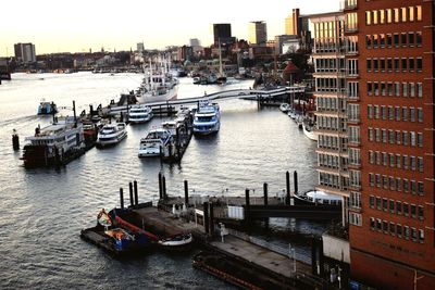 High angle view of boats moored at harbor