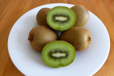 Close-up of fruits in plate on table