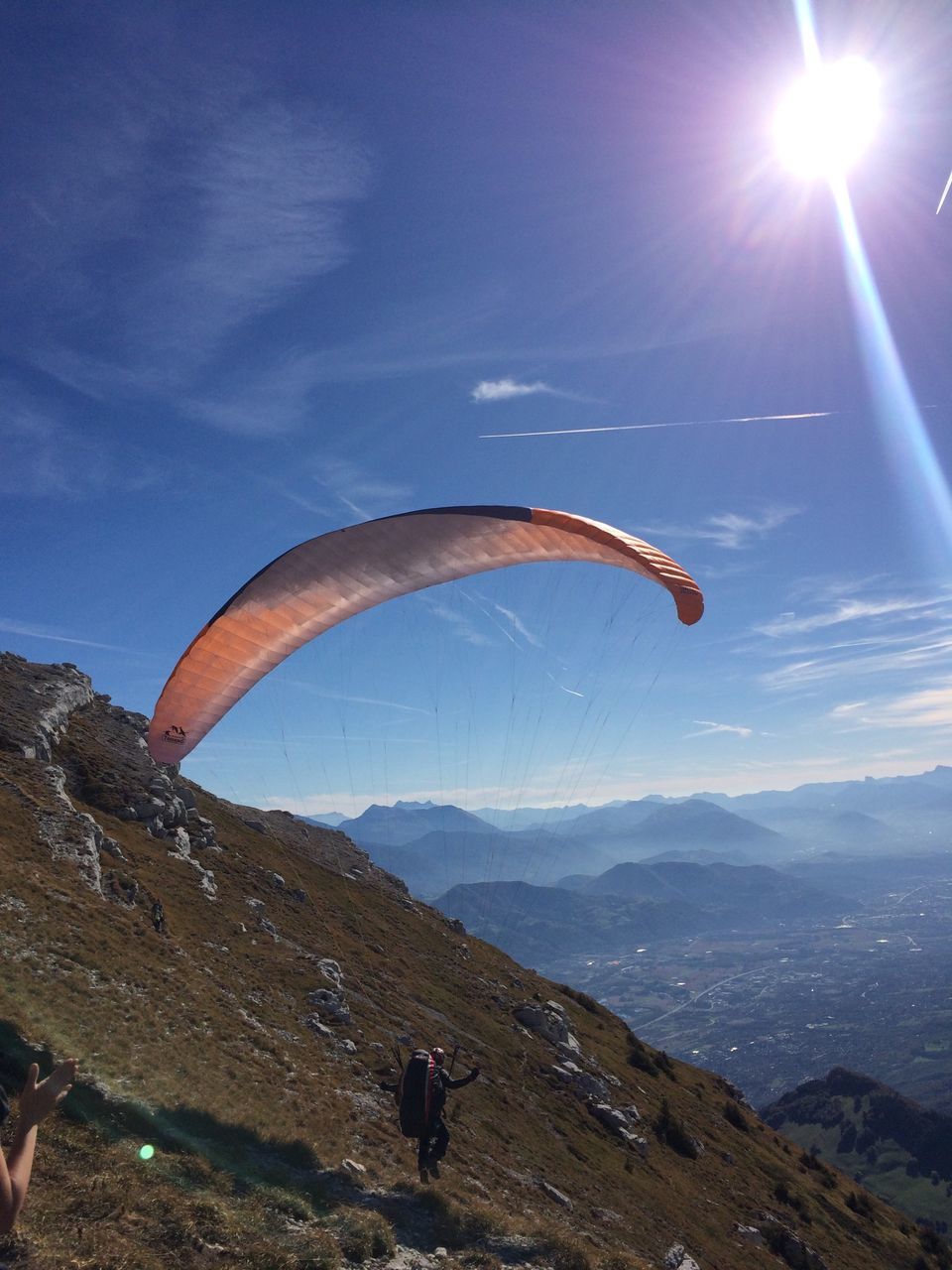 leisure activity, lifestyles, extreme sports, adventure, men, mountain, sunlight, sky, unrecognizable person, blue, sun, mid-air, sport, lens flare, full length, sunbeam, scenics, tourist