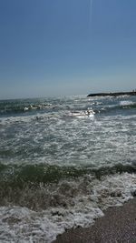 Scenic view of sea against clear sky