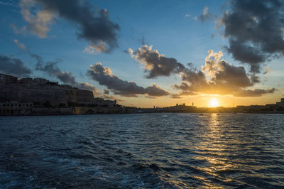 Scenic view of sea against sky during sunset