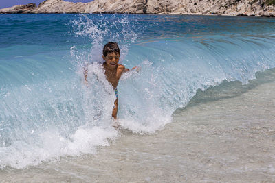 Man surfing in sea