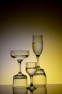 Glassware of different sizes against colorful background