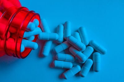 Close-up of blue objects over white background