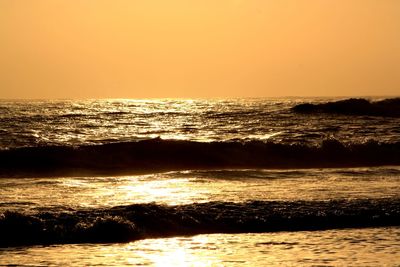 Scenic view of sea at sunset