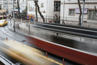 Blurred motion of train at railroad station