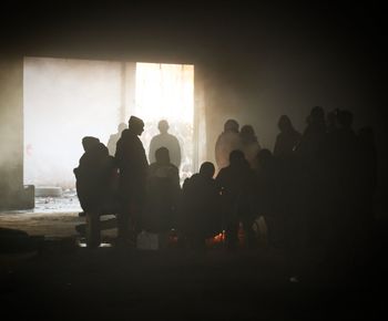 Silhouette people in corridor