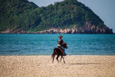 Man riding horse