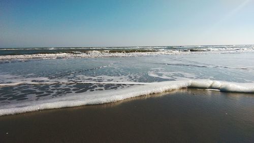 Scenic view of sea against clear sky