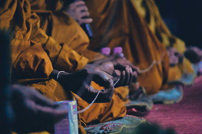 Close-up of woman holding hands