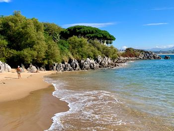 Scenic view of sea against blue sky