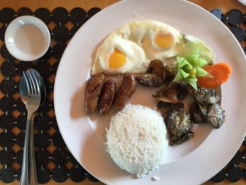 Close-up of breakfast served on table