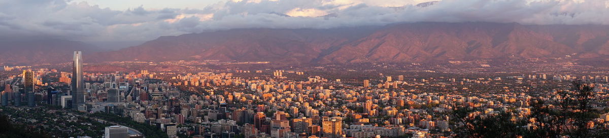 Panoramic view of cityscape at night