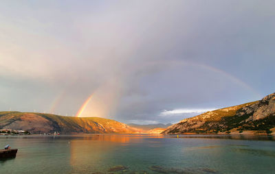 Rainbow over the sea and mountains