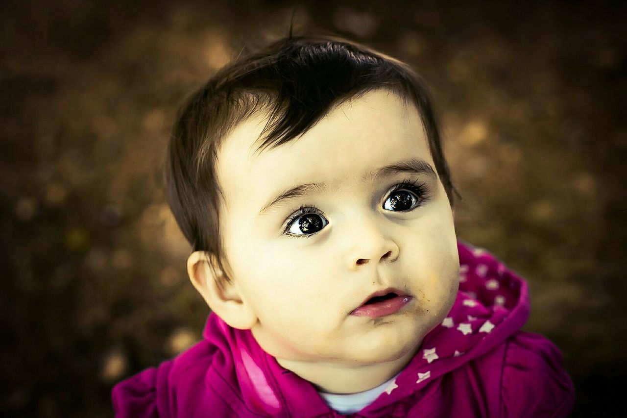 innocence, childhood, cute, real people, portrait, one person, headshot, focus on foreground, looking at camera, babyhood, close-up, baby, front view, human face, indoors, human eye, day, people