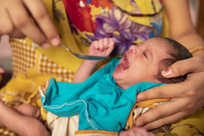 Cropped image of woman with iv drip